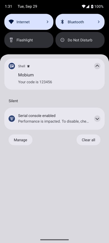 mobium notifications --shade open on an Android 15 emulator